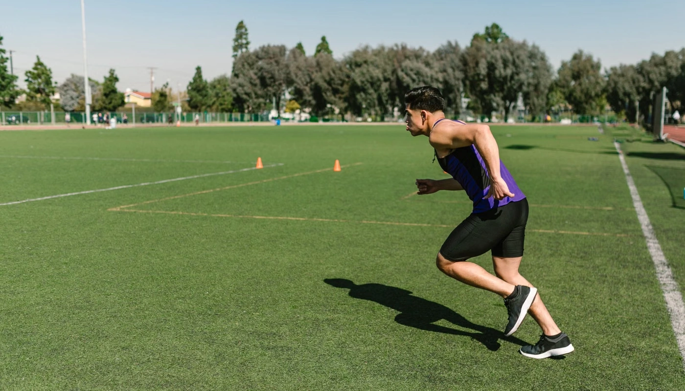 Athlete practising acceleration mechanics during sprint training